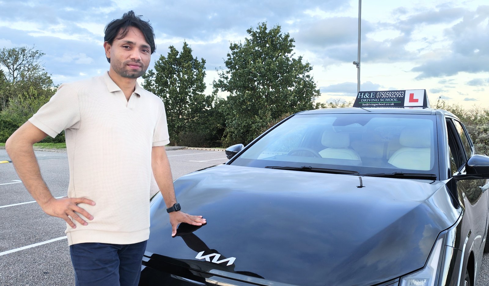 H&E Driving School — Mohammad Habib with KIA EV4 GT-Line automatic teaching car, Nottingham