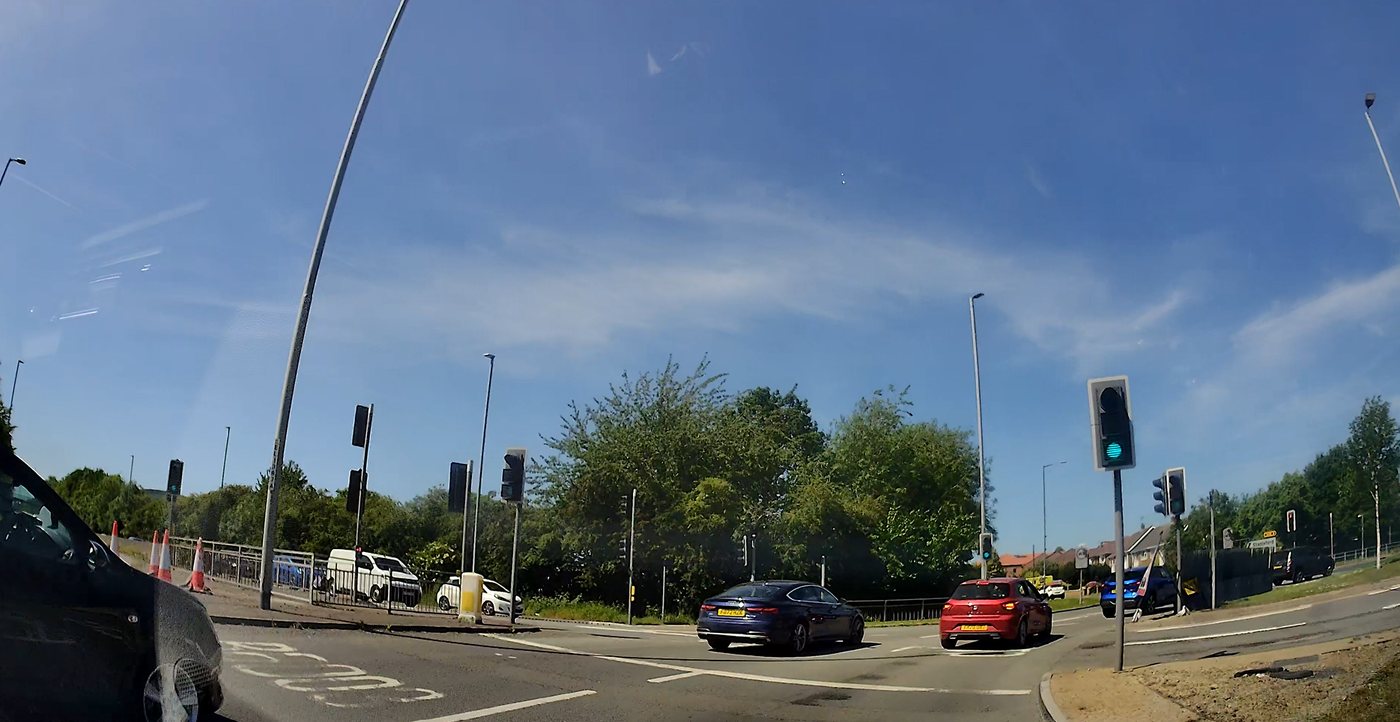 A sat nav mounted on a car windscreen during a driving lesson in Nottingham
