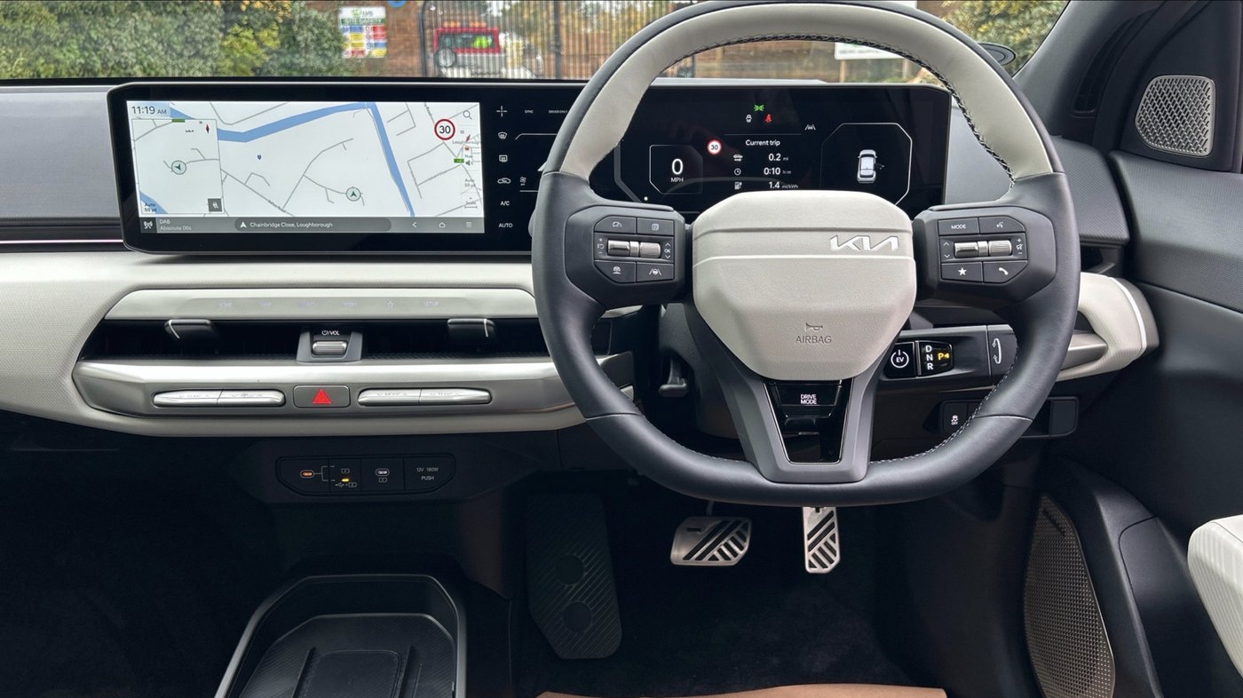KIA EV4 GT-Line interior — panoramic touchscreen and steering wheel, H&E Driving School Nottingham