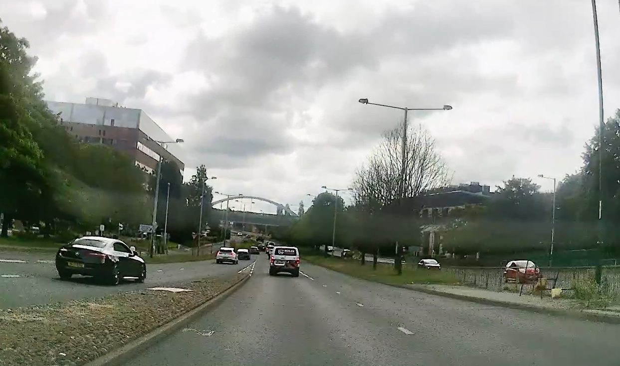 Automatic car indicator signalling before a turn on a Nottingham road